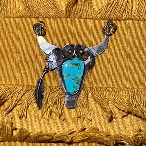 Turquoise pendant bullskull stamped